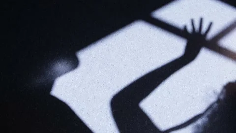 Shadow hand dancing sunny day Stock Footage 131010558