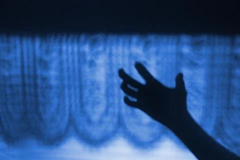 Shadow of a hand Stock Photos