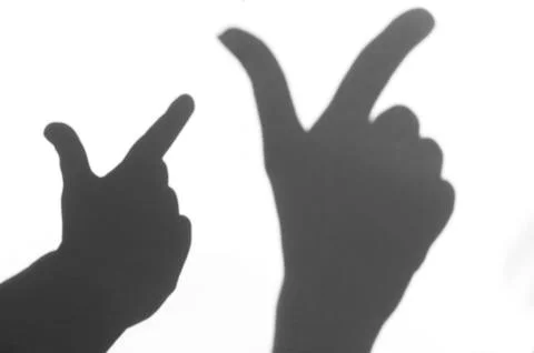 The shadow of the hand white background close-up Stock Photos