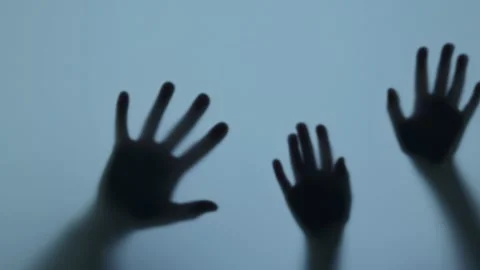 Shadow of the hands knock on the window, blur. Murderer, killer or robber Video stock 225422895