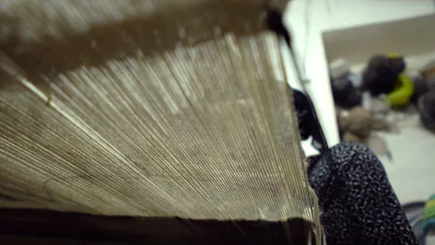 Shadow of the hands of an old lady weaving Stock Footage 336174250