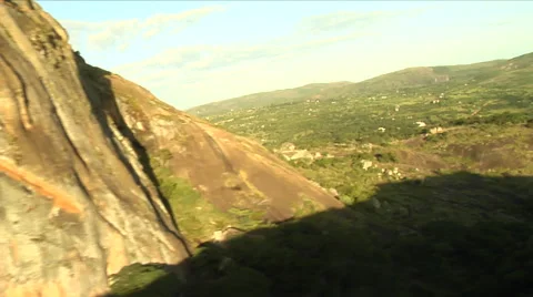 Shadow of helicopter on granite rockface Stock Footage 53049512