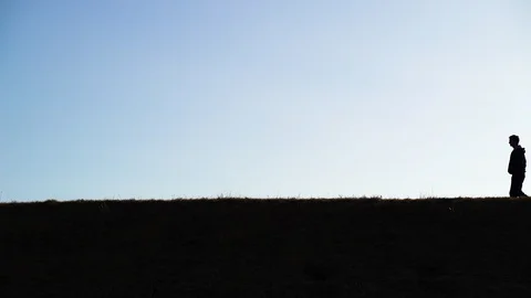 Shadow image of man walking alone at public park, Zagreb, Croatia. Video stock 105502924