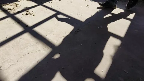 Shadow of a killer with gun in a dark scary building Stock Footage 269904045