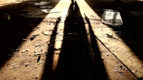 Shadow of a killer walking away Stock Footage