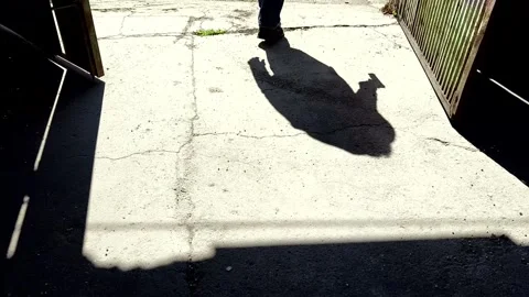 Shadow of a killer walking away Stock Footage 269904042