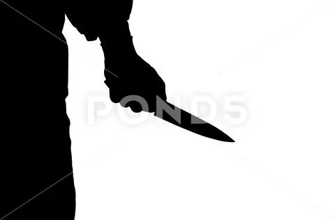 Shadow of killing knife in hand, Stabbing attack, Killer holding knife Stock Photos