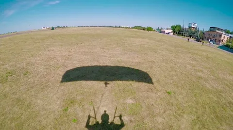 Shadow of landing skydiver Stock Footage 68858799
