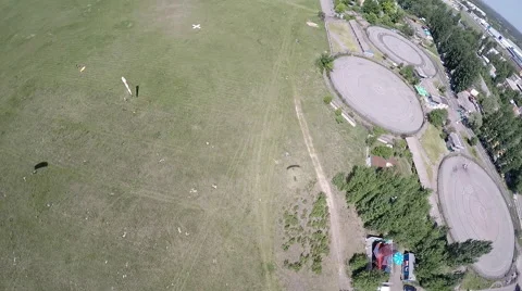 Shadow of landing skydiver from the head point of view Video stock 57667646
