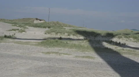 The shadow of a large windturbine Stock Footage 67603000