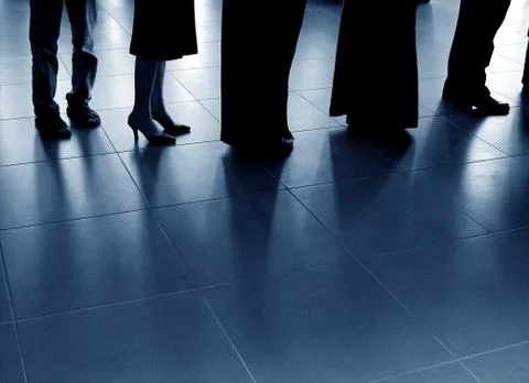Shadow of lining up people Stock Photos