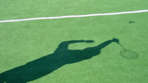 Shadow of a man with a badminton racket Stock Footage 153581535