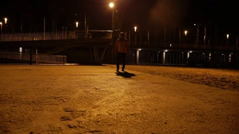 Shadow of a man in the city at night Stock Footage 104123557