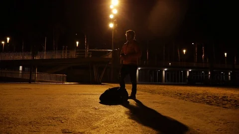 Shadow of a man in the city at night Stock Footage 104123558