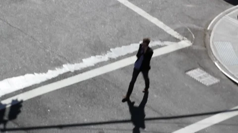 Shadow of a man crossing the stret - high angle Video stock 42899883