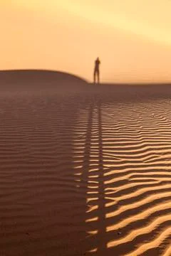 Shadow of a man in the desert Stock Photos