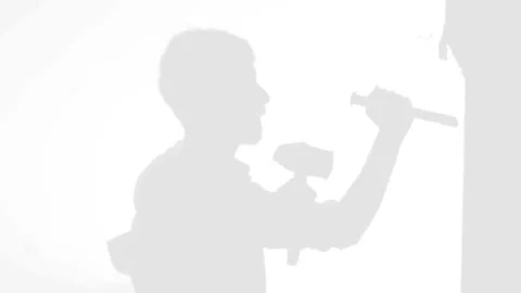 Shadow Of Man Hitting Chisel With Sledge Hammer Stock Footage 314389821