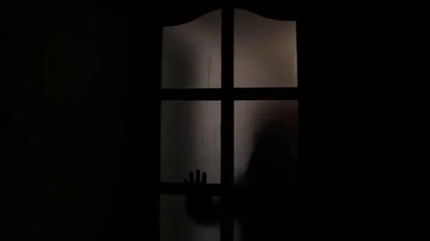 The shadow of a man with a knife Stock Footage 84840955