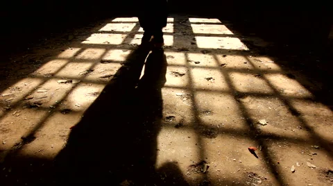 Shadow of a man with long stick approaching Stock Footage 47131502