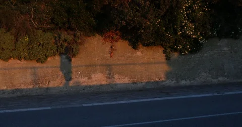 Shadow of a man walking Stock Footage 104123584