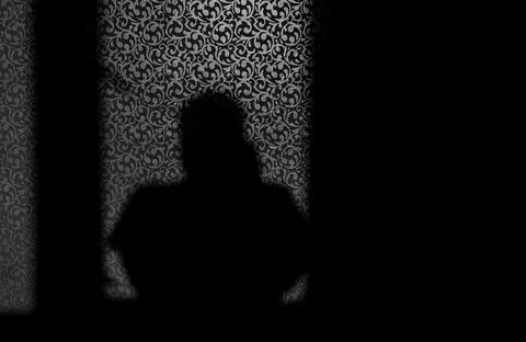 Shadow of a man on wall Stock Photos