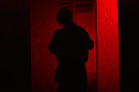 Shadow of a man with a weapon Foto stock