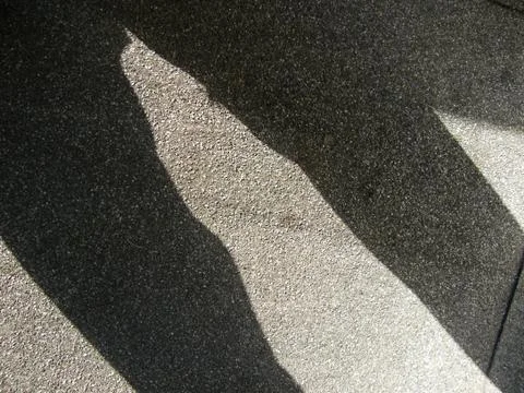 Shadow of a man`s legs Foto stock