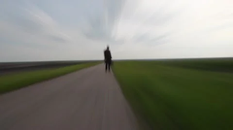 Shadow of men walking on the empty road ,walking with bag , looking for new life Stock Footage 51130354