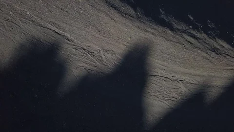 The shadow of the mountains on ground Stock Footage 99615811