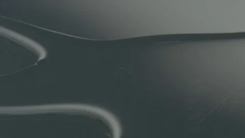 Shadow Moves Over Clear Oil Blob Stock Footage 77780347