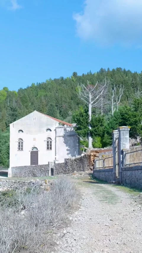 Shadow moving across white facade of building Stock Footage 294963831