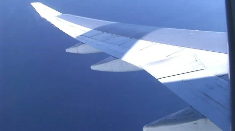 Shadow moving on plane wing Stock Footage 113557