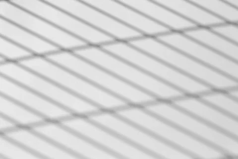 Shadow overlay effect for photo. Shadows from grid lines or grating of a fenc Stock Photos