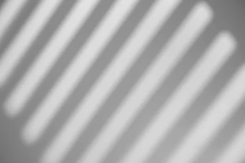 Shadow overlay effect. Shadows of window frames, bars and lines on the wall i Stock Photos