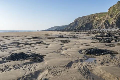 Shadow patterns from evening light on Cornwall beach Foto stock