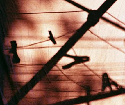 Shadow pegs for clothes Foto stock