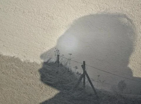 Shadow from a people-head Stock Photos