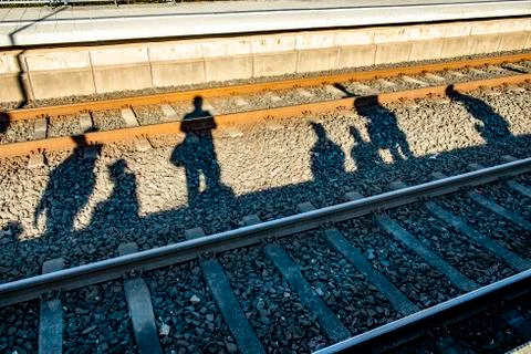 Shadow of people waiting for the train Stock Photos