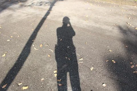 Shadow of a person on the ground Foto stock