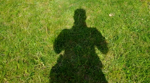 The shadow of the photographer Stock Footage 38977808