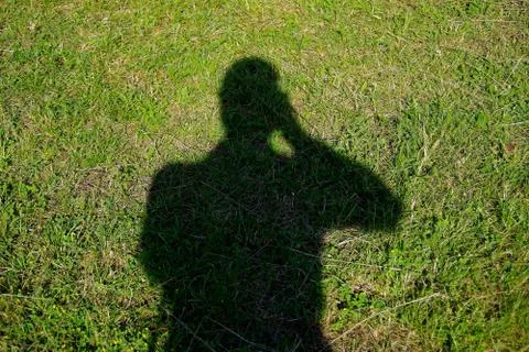 The shadow of the photographer Stock Photos