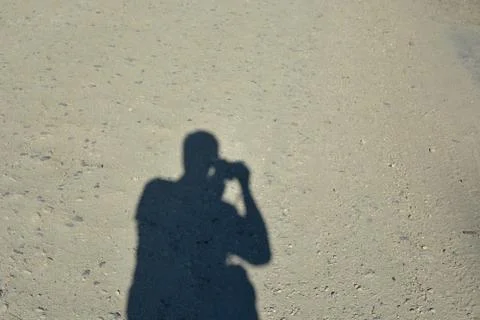 Shadow of the photographer Stock Photos