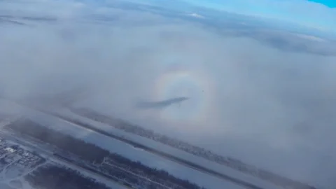 The shadow of the plane on Cumulus clouds Stock Footage 74298243