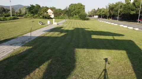 Shadow of plane monument move over grass. Timelapse. Kraljevo. Serbia Stock Footage 40707373