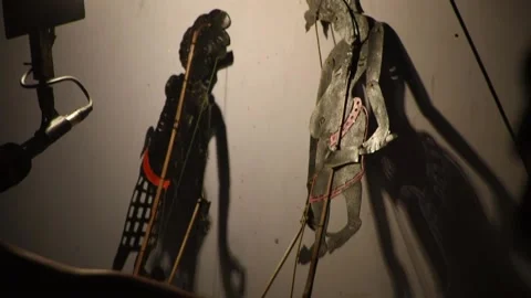 Shadow play on a white screen in south Thailand Stock Footage 138414088