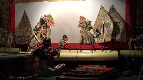 Shadow puppet player during Wayang Kulit show Yogyakarta, Indonesia Stock Footage 78468276