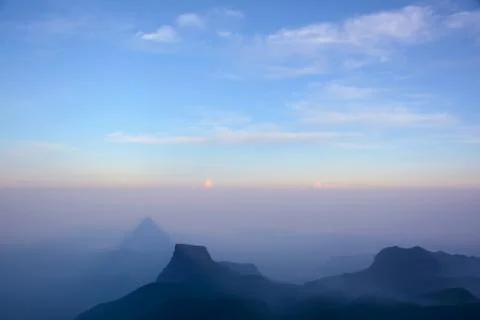 Shadow of the pyramid - miracle viewed form the holy Sri Pada Mountain (Adam' Stock Photos