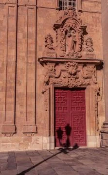 Shadow on red doors Stock Photos