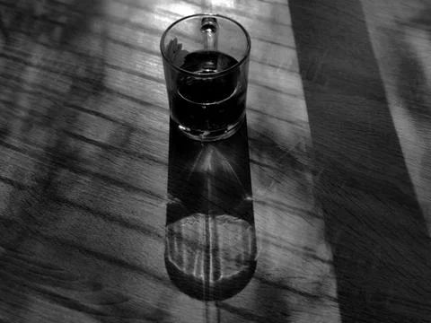 Shadow, reflection of a mug with tea Stock Photos