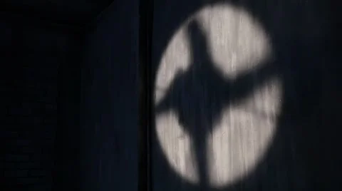 Shadow of a rotating fan on the wall Stock Footage 48041544